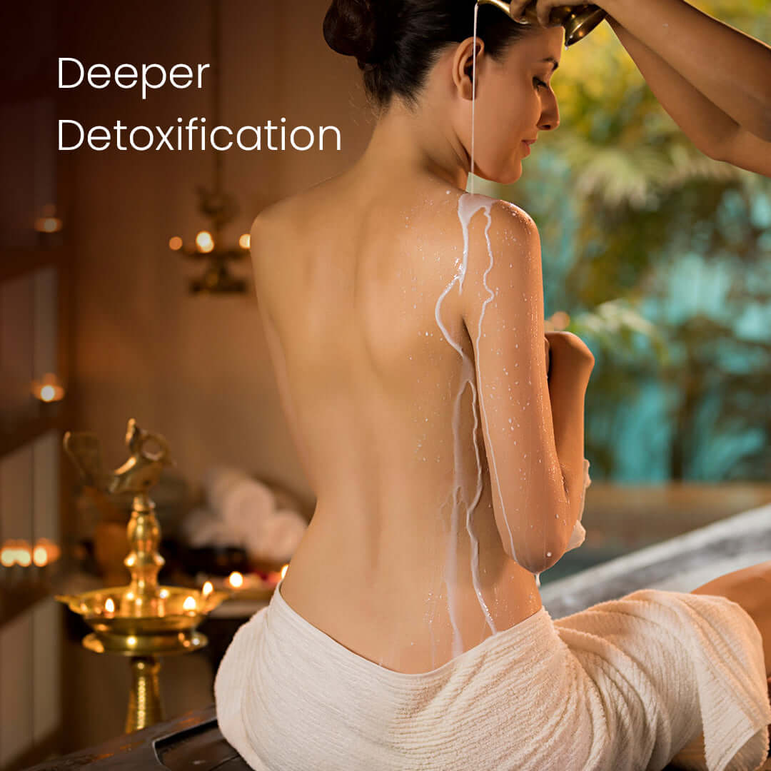 Traditional Ayurvedic oil pouring therapy is used in Ayurveda Body Detox to promote deep cleansing and relaxation.